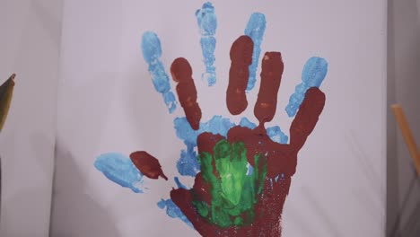 Colorful-family-handprint-painting,-a-personal-touch-of-home-art