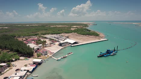 Sand-extraction-plant-in-Matamoros,-Mexico,-overlooking-the-Gulf-of-Mexico