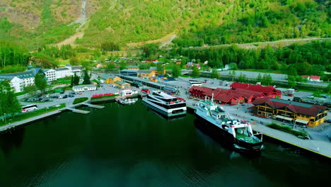 Aerial-View-of-Ferry-Boats-in-Port-of-Flam,-Norway,-Tourist-Destination-in-Aurland-Fjord,-Drone-Shot