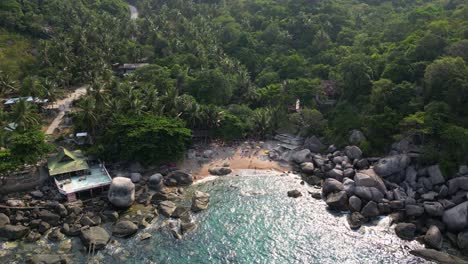 Slow-motion-cinematic-drone-push-in-to-beautiful-beach-on-tropical-island