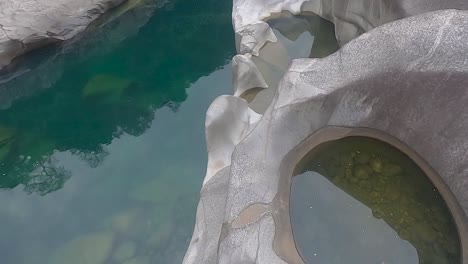 naturally-formed-white-shiny-stone-in-unique-shape-at-mountain-river-bed-at-morning-video-is-taken-at-Sliang-wah-Umngot-amkoi-jaintia-hill-meghalaya-india