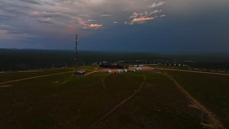 Aerial-view-around-the-top-of-the-Kaunispaa-fell,-summer-sunset-in-Saariselka,-Lapland