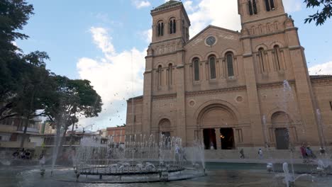 Catedral-Metropolitana-de-Medellín's-façade-with-fountain-in-Colombia