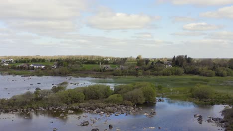 Aerial-dolly-flying-over-the-Corrib-lake-and-the-Annaghdown-Abbey