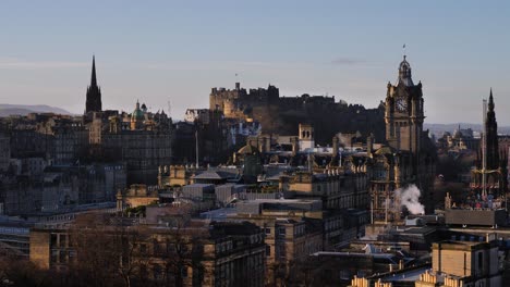 View-of-Edinburgh-Castle-and-skyline-from-Calton-Hill-on-a-winters-morning,-Scotland