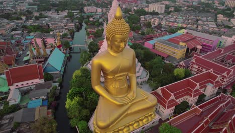 Explore-the-golden-splendor-of-Bangkok's-revered-Buddha-statue-from-a-bird's-eye-view-with-in-this-captivating-drone-footage