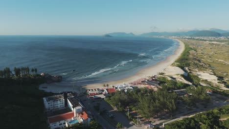 Complete-aerial-view-of-Joaquina-Beach-in-Florianópolis,-Brazil