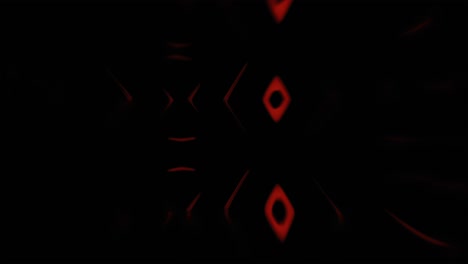 Eine-Faszinierende-Anordnung-Roter-Rautenformen,-Die-An-Furchterregende-Augen-Erinnern-Und-In-Der-Dunkelheit-Leuchten