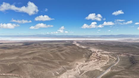 Hyperlapse-Aerial-view-of-the-landscape-of-Salinas-Grandes,-natural-salt-flats-of-Jujuy-and-Salta,-Argentina