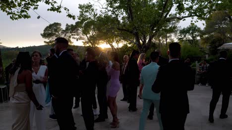 Sunset-at-a-wedding-venue-in-Montpellier-with-guests-mingling