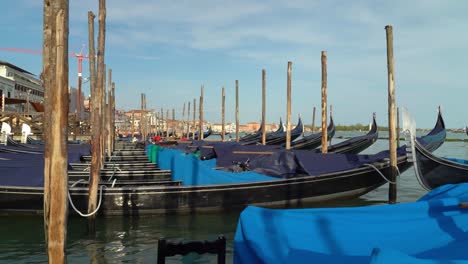 Gondolier-Parks-His-Gondola-in-the-Parking-Spot-near-Grand-Canal-in-Venice