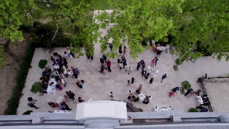 Top-down-view-of-guests-at-an-outdoor-wedding-courtyard