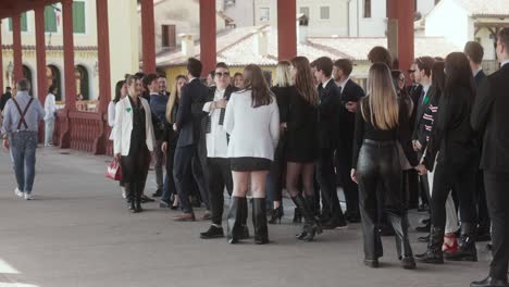 Group-of-People-Happily-Dancing-In-Daytime-In-Bassano-del-Grappa,-Italy