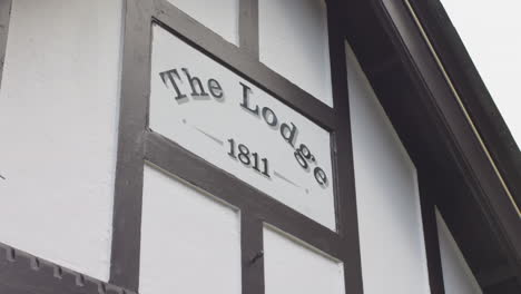 Closeup-shot-of-printing-of-The-lodge-in-Blessington-Street-Basin-at-Dublin,-Ireland