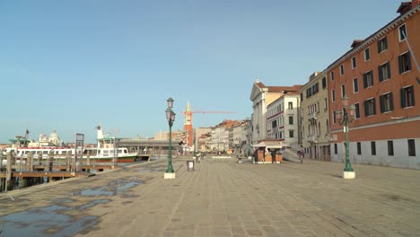 Walking-in-Venice-early-in-the-morning-near-Grand-Canal