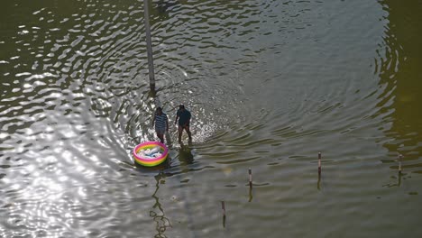 On-April-23,-2024,-residents-navigated-through-flooded-streets-in-the-northern-Emirates-of-the-UAE-after-record-breaking-rains-hit-the-country