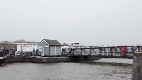 Passengers-Seen-Disembarking-At-Greenwich-Pier-On-Overcast-Cloudy-Day