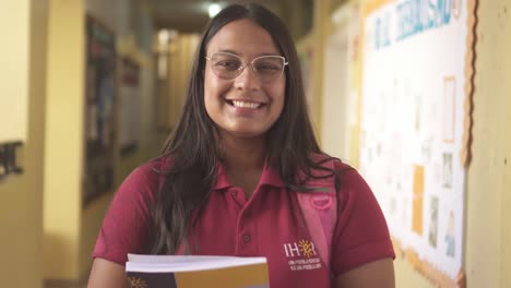 Young-Latina-student-smiling-at-the-camera-in-a-school-in-the-public-education-system-of-Honduras