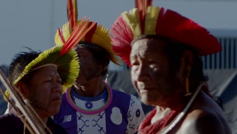 Native-amazonian-warriors-with-colorful-headdress-carrying-bows-and-arrows