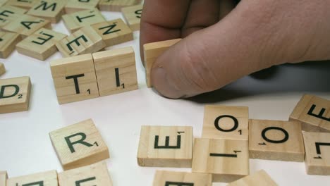 Social-media-word-TIKTOK-app-made-on-table-with-Scrabble-tile-letters