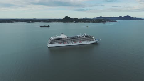 A-large-cruise-ship-in-Brazil-dwarfs-the-surrounding-ocean-and-takes-up-a-significant-portion-of-the-view