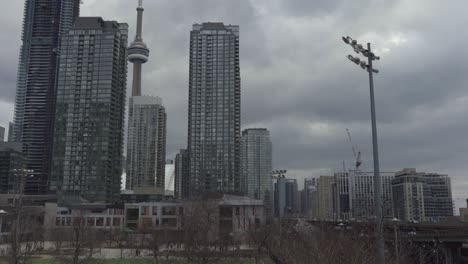 Downtown-Toronto-Skyline,-Cars-Driving-On-Gardner-Expressway