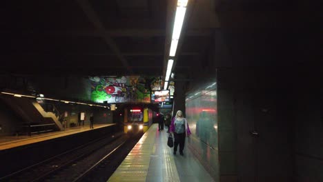 Argentine-people-take-subway-Train-arrival,-underground-public-service-transportation-in-the-capital-City-of-Buenos-Aires