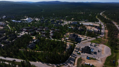 Saariselka-village-center,-sunny,-summer-day-in-Lapland,-Finland---Aerial-view