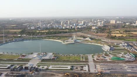 garden-and-residential-area-are-visible-around-in-the-huge-lake