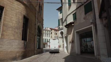 Typical-Street-Scene-With-Narrow-Road-In-Bassano-Del-Grappa,-Veneto,-Italy