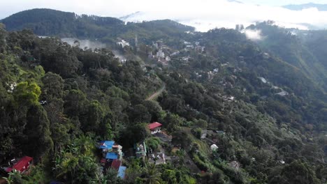 Aerial-Panning-Shot-of-Village-in-the-Mountains-of-Ella,-Sri-Lanka