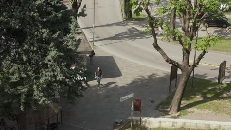 People-Walking-On-Quiet-Street-In-Bassano-del-Grappa,-Veneto,-Italy