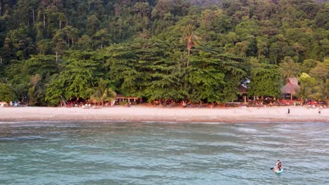 Aerial-View-Of-Lonely-Beach-Bathed-in-Golden-Hour-Light-At-Koh-Chang