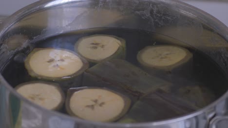 Boiling-plantain-banana-to-make-banana-puree,-part-1