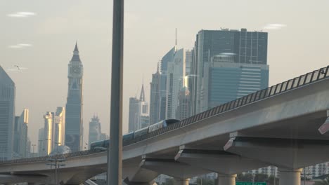 Mesmerizing-footage-of-Dubai-Metro-emerging-from-ADCB-metro-station-post-flood,-capturing-the-city's-resilience