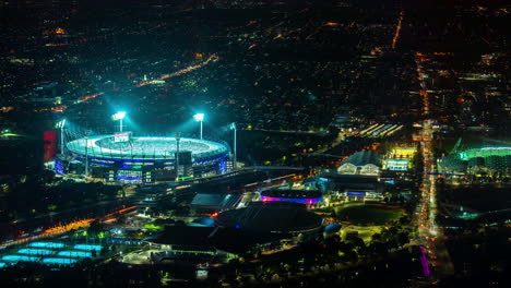 Timelapse,-Estadio-De-Cricket-En-Melbourne,-Australia,-Durante-El-Juego-Nocturno-Y-El-Tráfico-Callejero