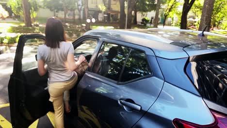 Woman-Enters-Driver's-Seat-and-Closes-Door,-Slow-Motion