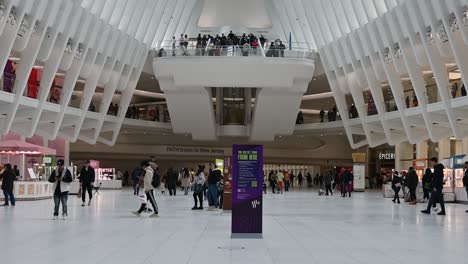 Walking-towards-PATH-trains-to-New-Jersey-in-Oculus-Transportation-Hub,-World-Trade-Center,-New-York,-United-States