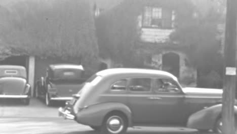 Classic-Car-Parks-in-a-Neighborhood-on-a-Calm-Spring-Day-of-1930s-in-BW