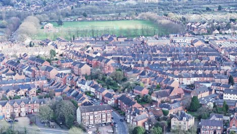 An-aerial-shot-over-the-densely-constructed-area-of-private-homes-in-Leicester,-UK
