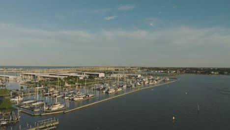 An-aerial-establishing-shot-of-the-Lakewood-Yacht-Club-in-late-afternoon-in-Seabrook,-Texas