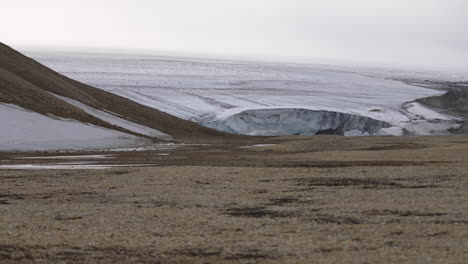 Glacier-on-Svalbard-Island,-Norway,-Wide-View-of-Ice-Cap-on-Coastline-of-Palanderbukta-Fjord