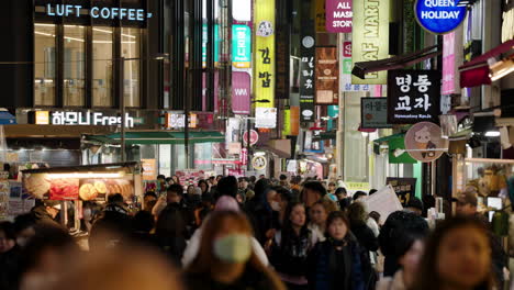 Crowded-People-During-Rush-Hour-Night-In-Myeongdong-Street-In-Seoul,-South-Korea