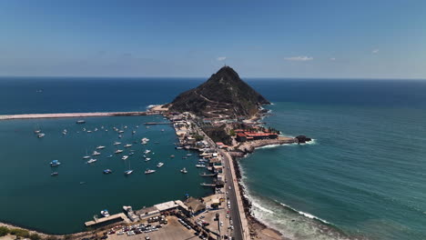 Aerial-view-approaching-the-Isla-El-Crestón,-sunny-day-in-Mazatlan,-Mexico