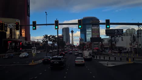 Driving-on-Las-Vegas-Strip-at-Evening,-Cars,-Lights,-Fontainebleau-Casino-Hotel-Resort,-Nevada-USA