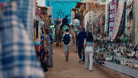 Colorful-market-street-with-numerous-local-handmade-craft-shops-in-Nubian-Village,-Aswan,-Egypt
