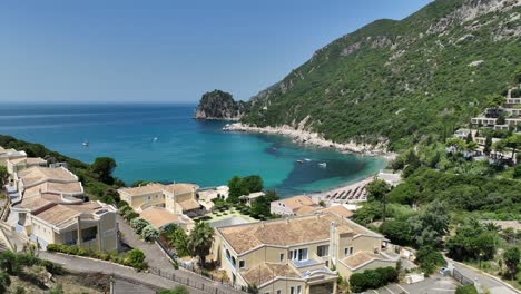 Breathtaking-view-of-Liapades-Beach-in-Corfu,-Greece,-with-clear-turquoise-waters-and-cliffside