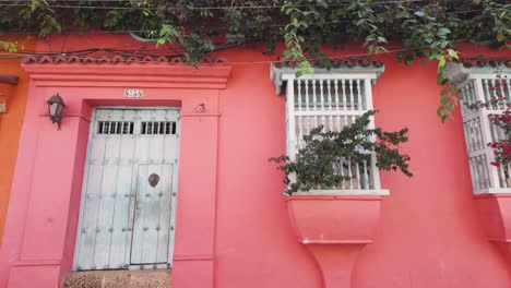 Quaint-orange-facades-with-vintage-doors-in-Cartagena's-old-town,-Colombia