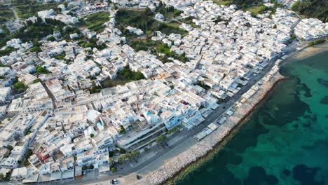 Aerial-footage-of-the-town-Parikia-on-the-island-of-Paros,-one-of-the-many-Cyclades-Islands-in-the-Aegean-Sea
