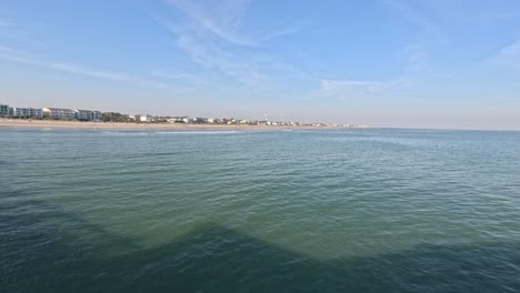 Folly-Beach-pier-looking-toward-the-shore-in-Charleston-South-Carolina-2024